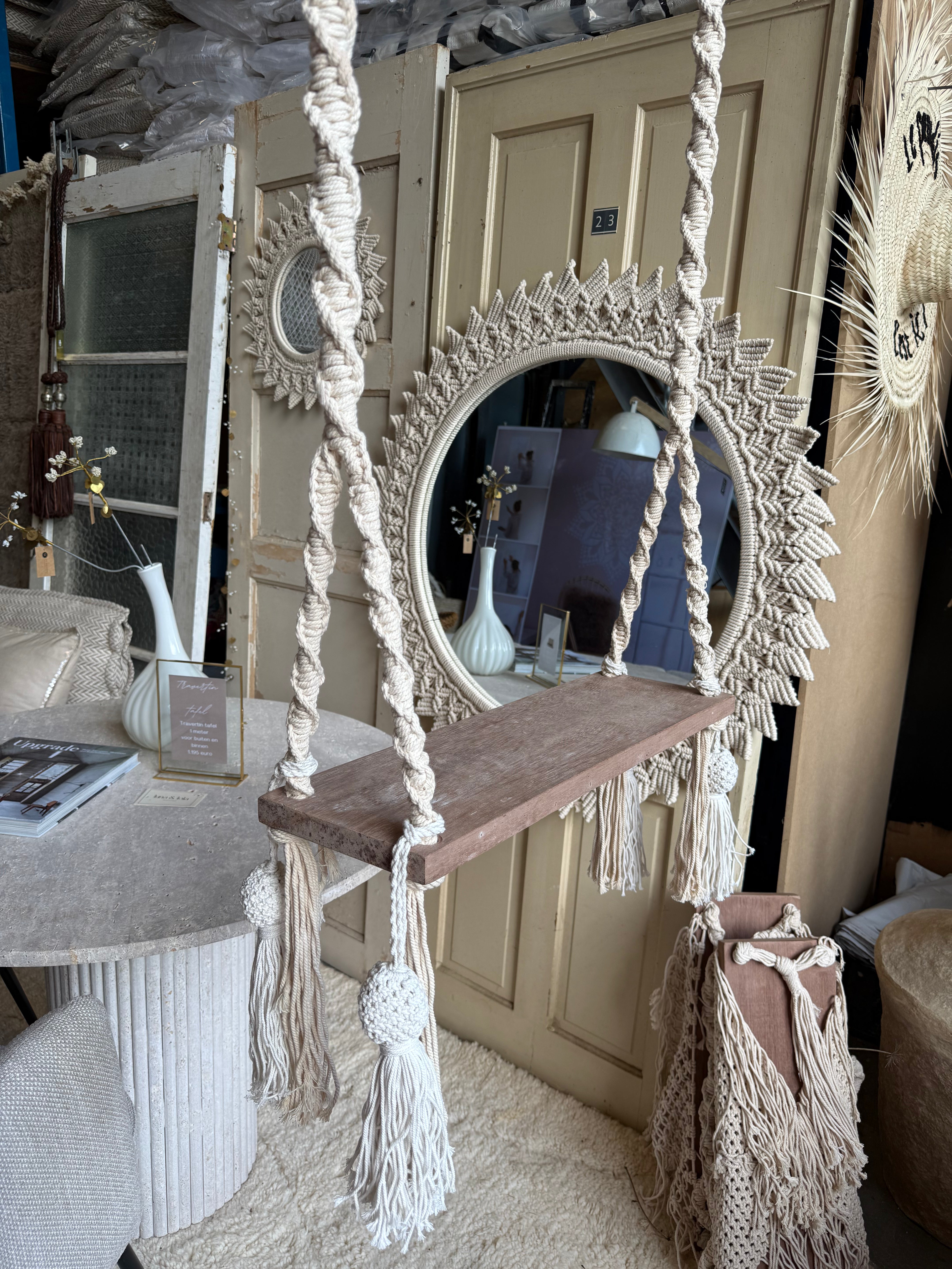 Swing with crochetwork decoration